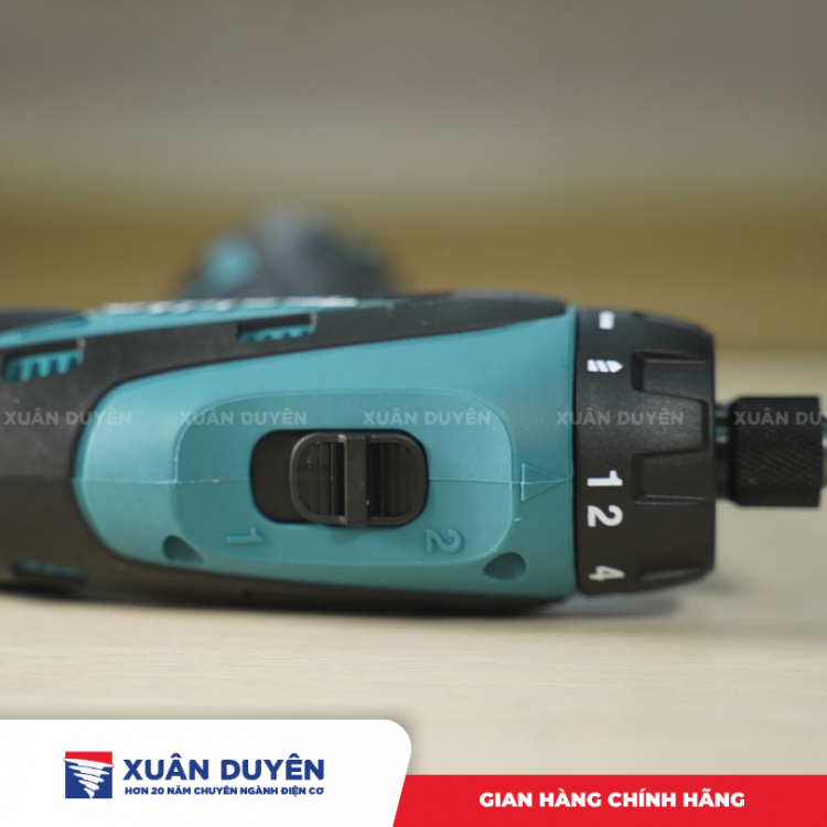 Máy khoan và vặn vít dùng pin 10.8V Makita DF030DWE (2 pin 1.3 Ah + 1 sạc DC10WA)